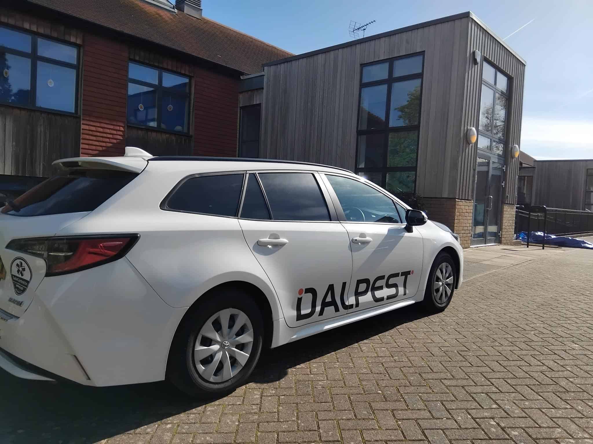 DALPEST Car at a school